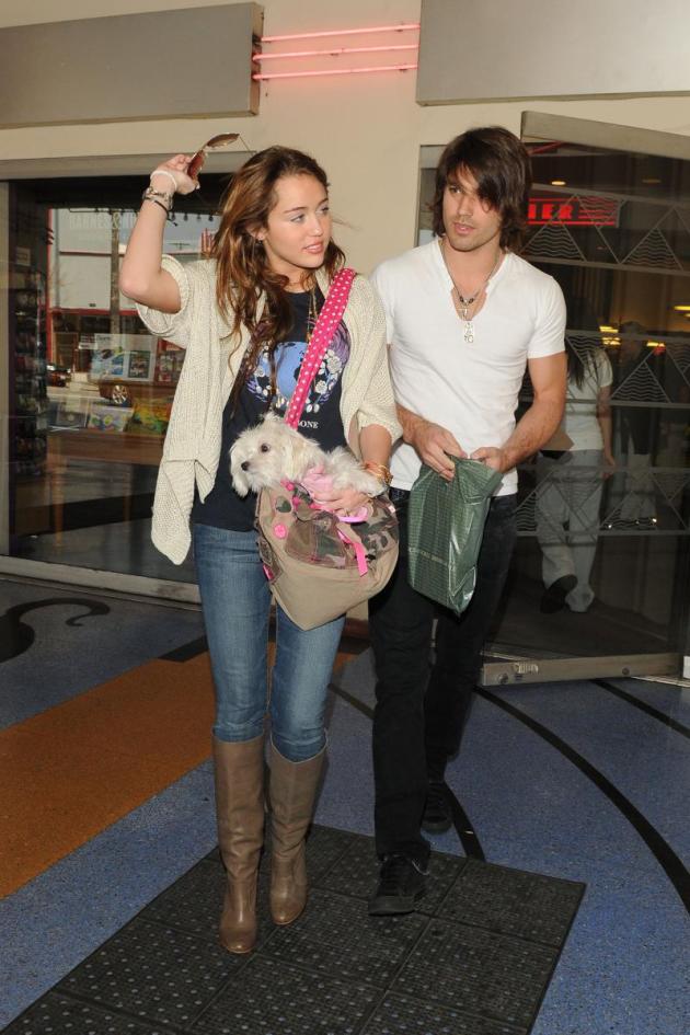 Miley Cyrus And Adam Sevani Ride Bikes Possibly Each.